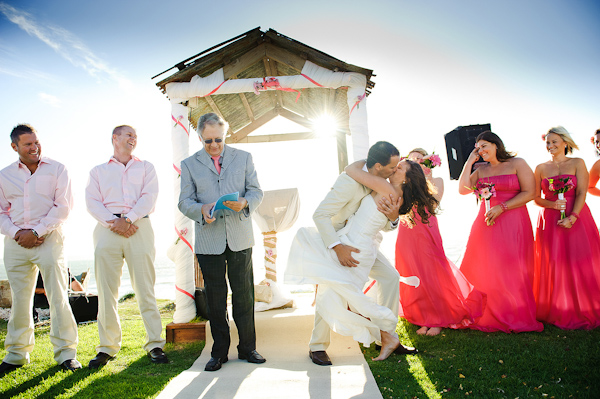 wedding photo by Eric Uys Photography, hilarious ceremony image, happy couple